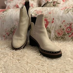 Dolce Vita white boots size 81/2 worn twice lots of detail 2in rubber lug heal